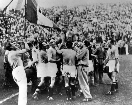 1934 World Cup Final. Rome, Italy. Italy 2 v Czechoslovakia 1. 10th June, 1934. The victorious Italian team carry their coach Vittorio Pozzo as they celebrate an historic victory.